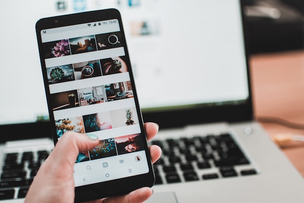 How often should business owners be using their Instagram account?